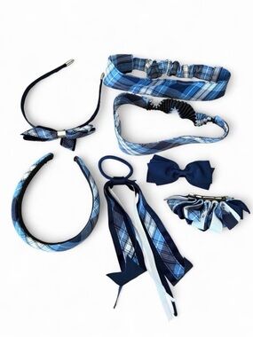 Seven piece bundle of blue plaid headbands, barrettes, and hair bows